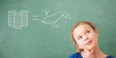 Girl thinking in front of a chalkboard.